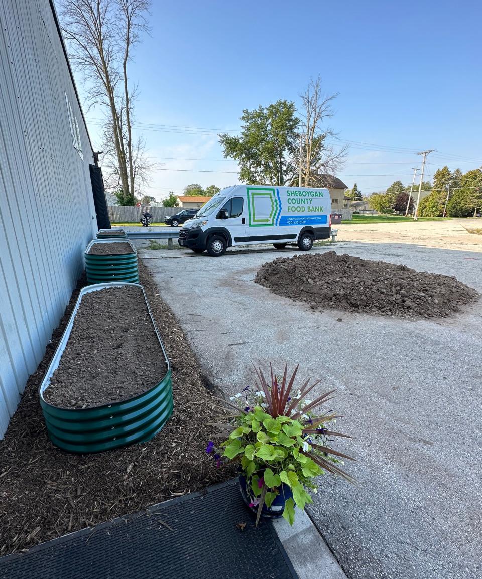 Raised garden beds created by Eagle Scout Isaac Brashaw outside the Sheboygan County Food Bank.