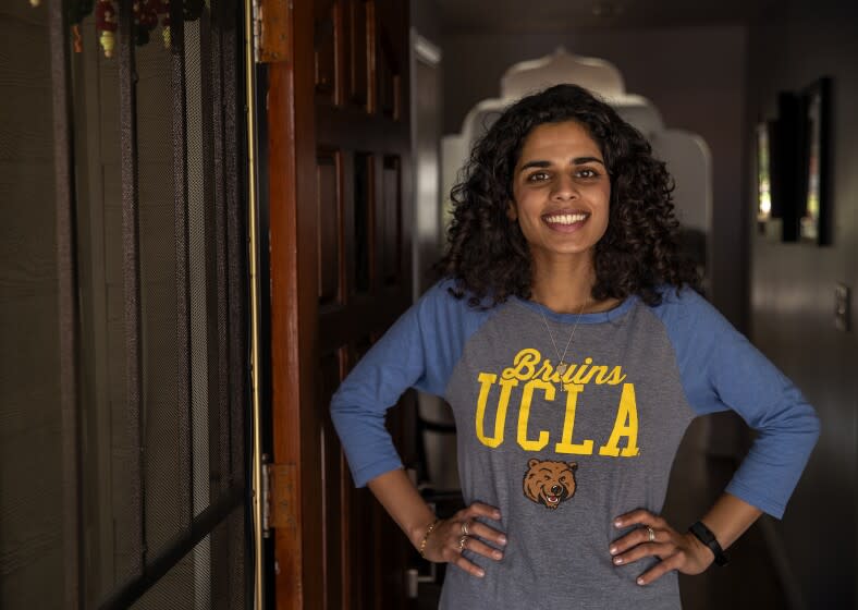 BURBANK, CA-MAY 23, 2022: Meera Varma, 23, a senior at UCLA, is photographed at her home in Burbank. Varma has struggled with her mental health for years and has taken her experiences to inspire her activism. Colleges are falling short to support students' mental health needs, and Meera experienced that first hand. (Mel Melcon / Los Angeles Times)