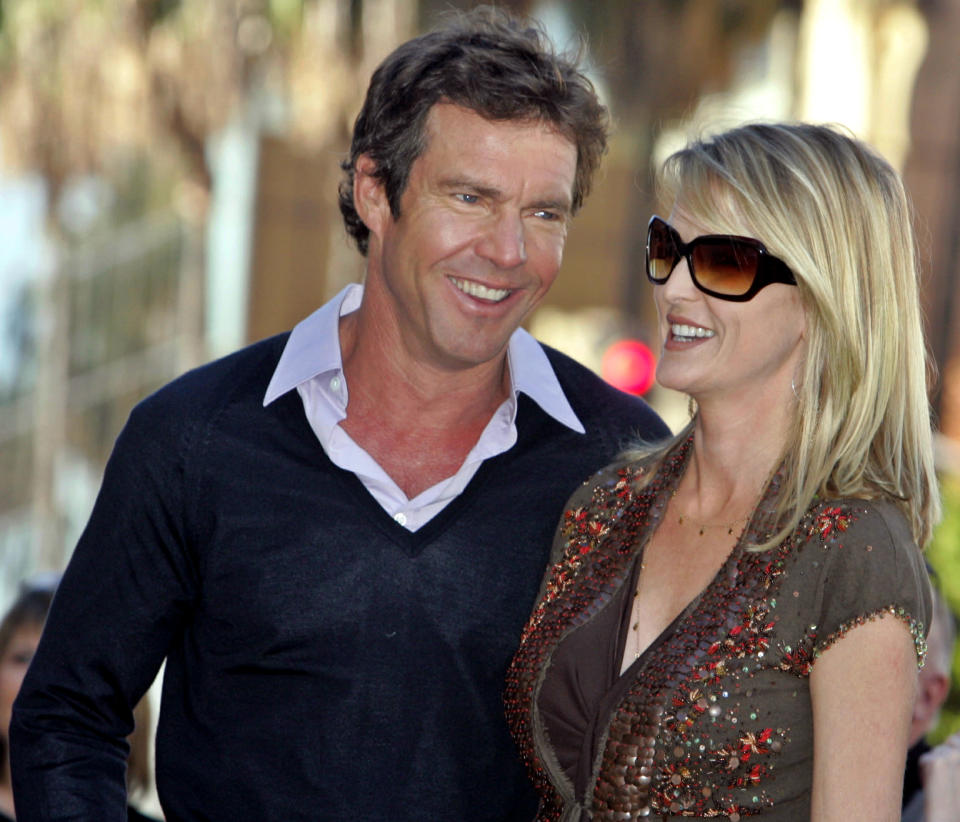 Actor Dennis Quaid and wife Kimberly stand together before ceremonies honoring Quaid with a star on the Hollywood Walk of Fame in Hollywood November 16, 2005. Quaid stars in the upcoming family comedy film "Yours, Mine and Ours." REUTERS/Fred Prouser