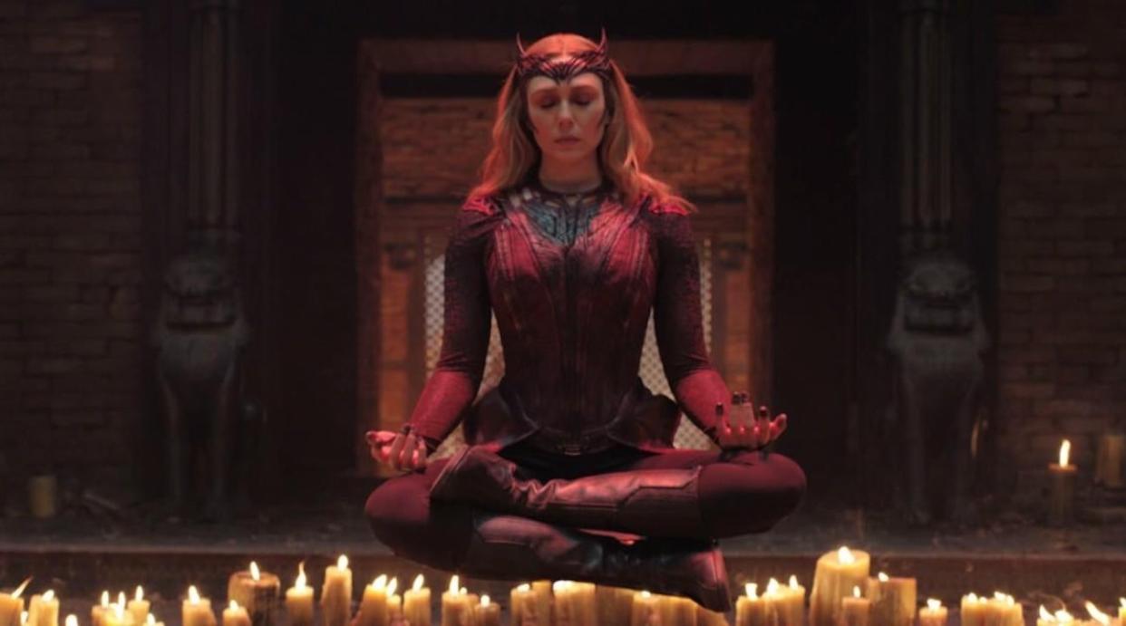  Elizabeth Olsen as Scarlet Witch hovering in Doctor Strange in the Multiverse of Madness. 