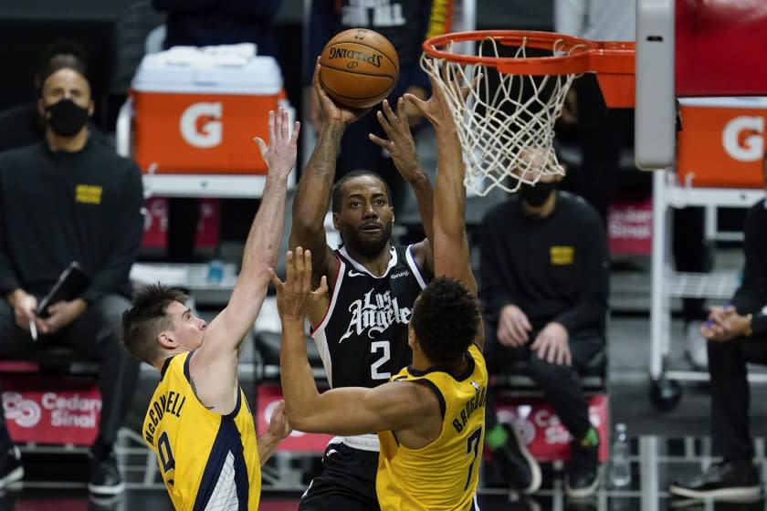 Los Angeles Clippers forward Kawhi Leonard (2) shoots against Indiana Pacers guard T.J. McConnell.