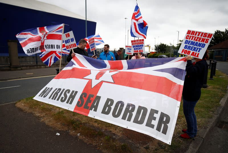 FILE PHOTO: Loyalists protest against the Northern Ireland Brexit protocol at Belfast Harbour Estate