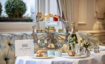 <p>Celebrating the best of the capital, <a href="https://www.booking.com/hotel/gb/the-kensington-london.en-gb.html?aid=2070929&label=hotel-afternoon-tea" rel="nofollow noopener" target="_blank" data-ylk="slk:The Kensington;elm:context_link;itc:0;sec:content-canvas" class="link ">The Kensington</a>'s London Landmarks Afternoon Tea takes in inspiration from London’s most recognisable and historic sites. For this hotel afternoon tea, you'll go on a gourmet tour of London's architectural feats from the opulent surroundings of the Drawing Room, complete with open log fires and sumptuous seating. </p><p>The afternoon tea is presented on a London Eye-inspired tea stand, served with a map of London illustrated by Eleni Sofroniou. Starting with a skyline of scones and sandwiches, you can then enjoy cockney staple Steak & London Ale Pie and a Colston Bassett Stilton & Broccoli Quiche. For dessert, 'The Gherkin' is crafted from white chocolate and dark chocolate ganache and 'The Shard' is made of carrot cake and milk chocolate.</p><p><strong>Price:</strong> From £42 per person</p><p><a class="link " href="https://www.booking.com/hotel/gb/the-kensington-london.en-gb.html?aid=2070929&label=hotel-afternoon-tea" rel="nofollow noopener" target="_blank" data-ylk="slk:BOOK A ROOM;elm:context_link;itc:0;sec:content-canvas">BOOK A ROOM</a><br></p>