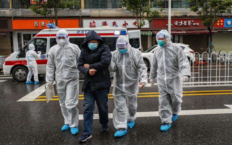 Wuhan has been placed on lockdown by Chinese authorities in a bid to contain the virus - AFP