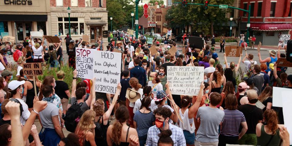 Protesters shutdown the intersection of Kirkwood and Walnut Street in Bloomington, Indiana, during the demonstration. Protesters are demanding justice for Vauhxx Booker, who was allegedly attacked at Lake Monroe on Saturday the 4th of July 2020.