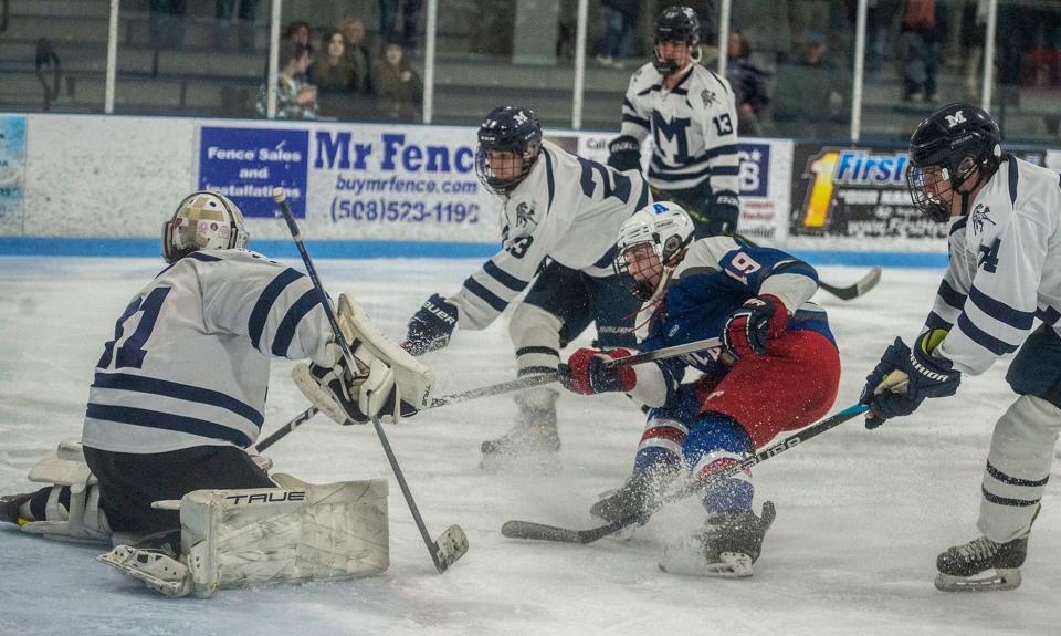 Ashland High School senior captain Ryan Abcunas with a shot against Medway at Pirelli Veterans Arena in Franklin for a round of 32 state tournament game, Feb. 28, 2024. The Clockers went on to win, 3-0.