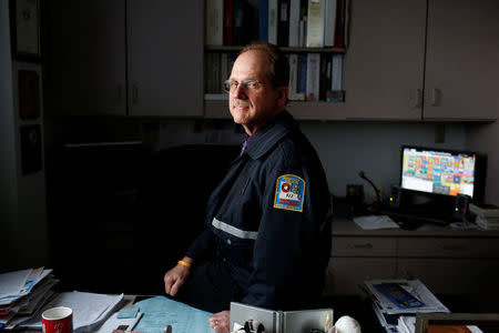 EMS Coordinator for the County of Broome Raymond Serowik poses for a portrait in his office at the Broome County Emergency Services center in Binghamton, New York, U.S., April 6, 2018. REUTERS/Andrew Kelly
