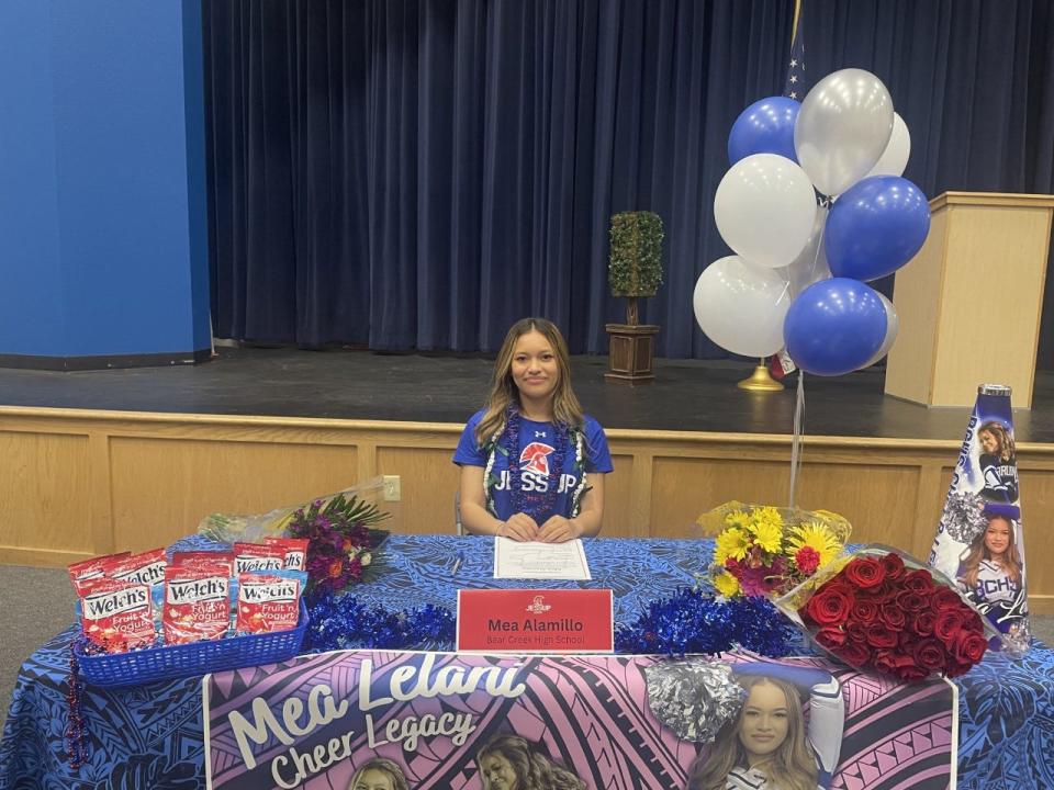 Mea Alamillo of Bear Creek cheer poses after signing her letter of intent to cheer at William Jessup University.