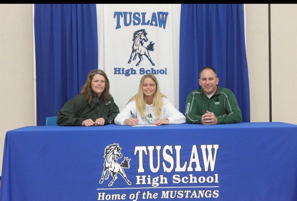 Tuslaw's Vanessa Frascone celebrates her decision to play basketball at Bethany College in West Virginia.