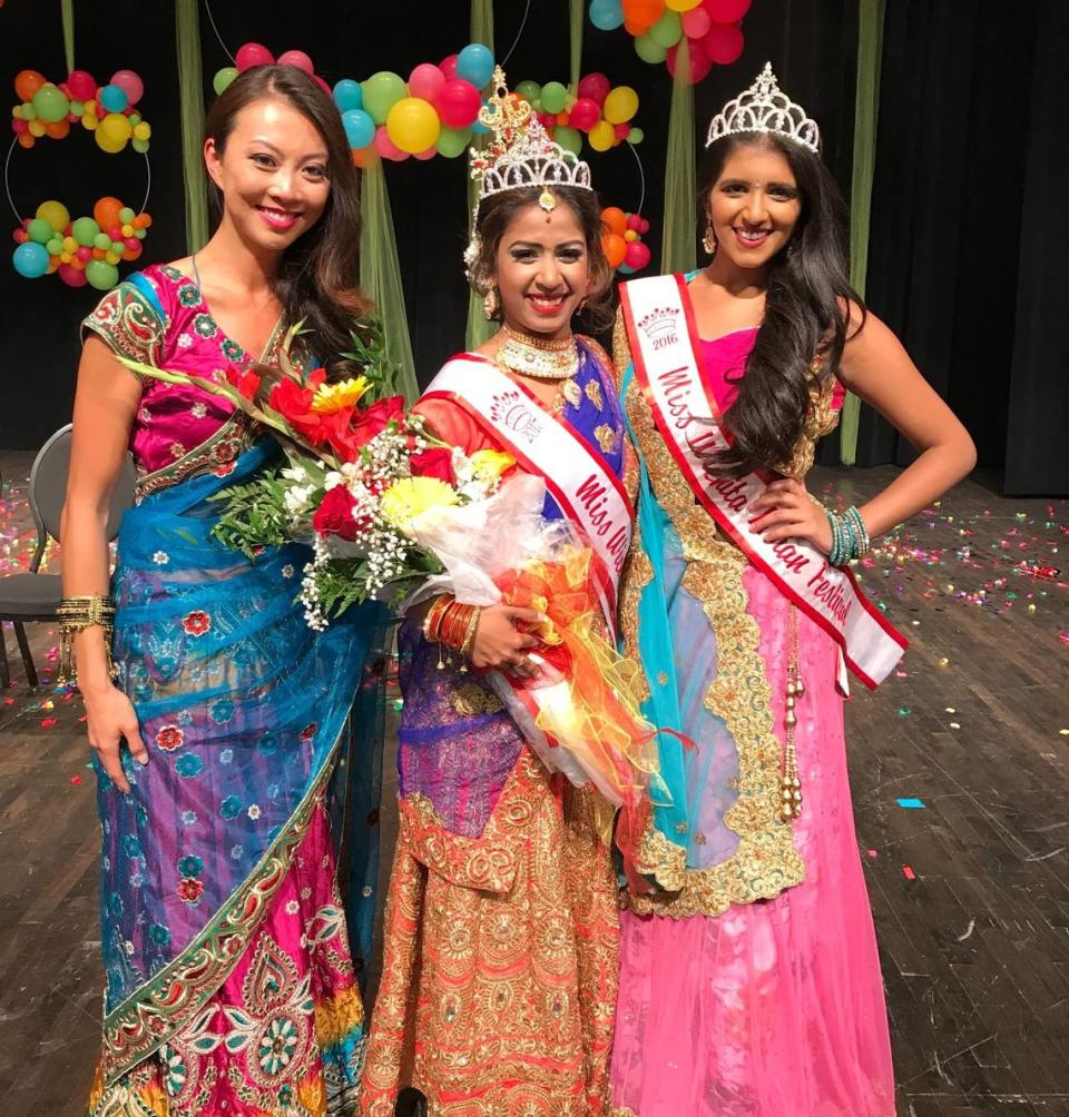 Lily Wu, left, poses with contestants from the Wichita Asian Festival’s 2017 scholarship pageant.