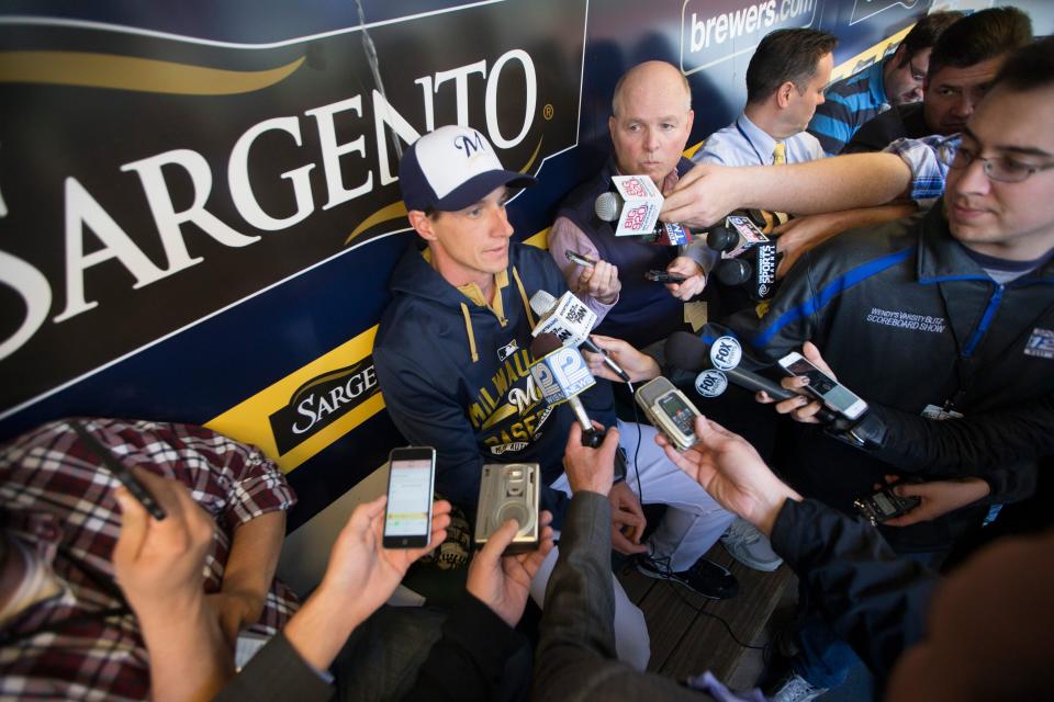 Former Brewers manager Craig Counsell (right) shown before batting practice before a game in May.