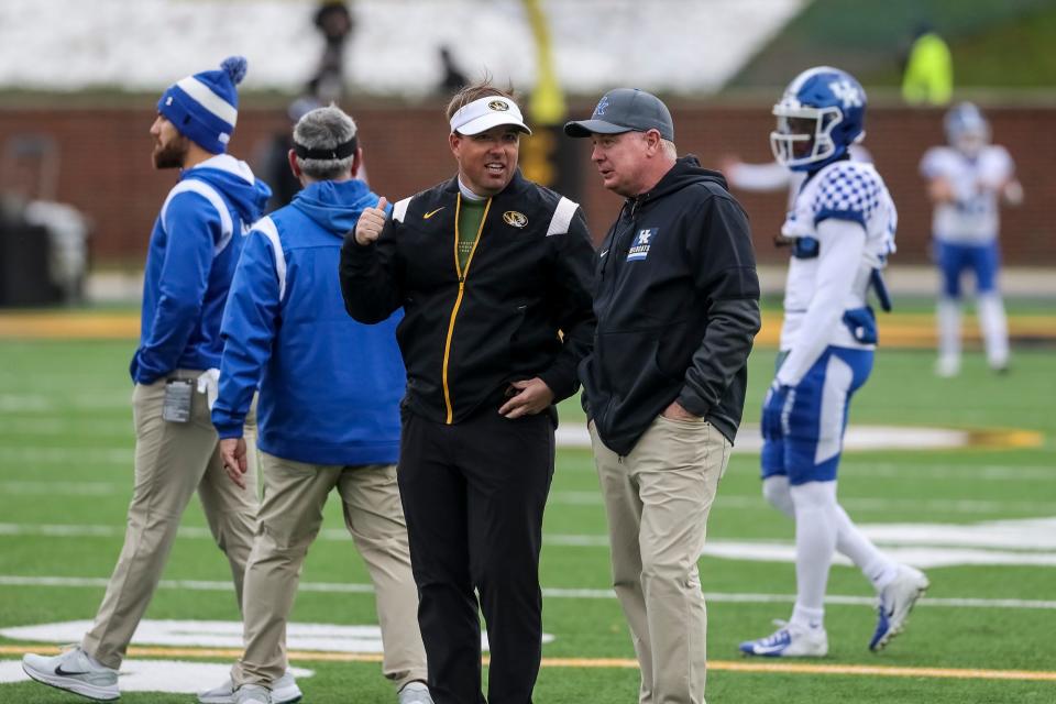 Missouri Tigers head coach Eli Drinkwitz talks with Kentucky Wildcats head coach Mark Stoops prior to the Tigers game against Kentucky Wildcats on Nov. 5, 2022, at Faurot Field Columbia.