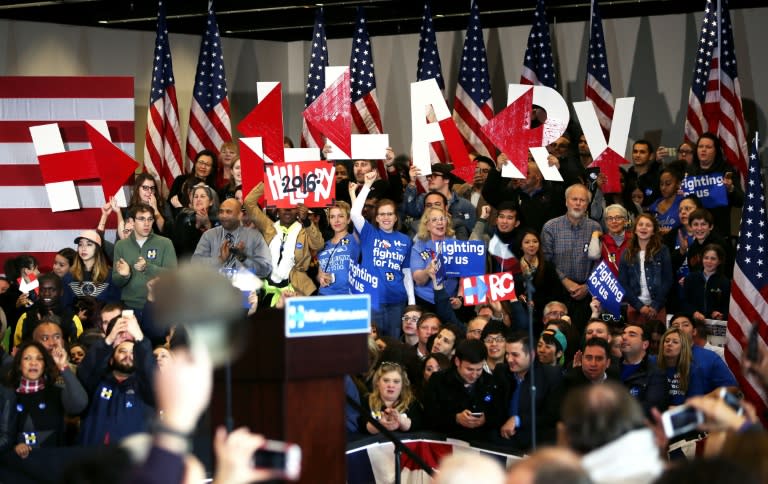 Supporters attend the caucus event of Democratic presidential candidate Hillary Clinton at Drake University in Des Moines, Iowa, on February 1, 2016