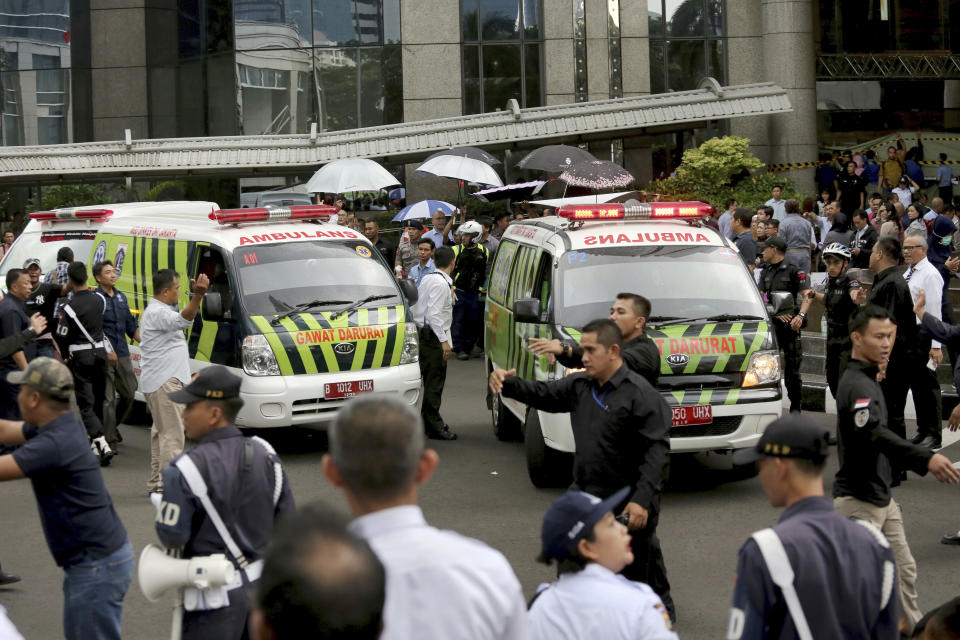 Ambulances leave the scene