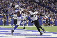 <p>Indianapolis Colts tight end Mo Alie-Cox (81) makes a catch for a touchdown in front of Jacksonville Jaguars outside linebacker Leon Jacobs (48) during the first half of an NFL football game in Indianapolis, Sunday, Nov. 11, 2018. (AP Photo/Darron Cummings) </p>