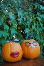 <p>Pair off your pumpkins with quirky his and hers looks—which, might we add, also bear hilarious resemblance to Mr. and Mrs. Potato Head. They'll work perfectly with your imaginative DIY costumes.</p><p><strong>Get the tutorial at <a href="http://www.jacolynmurphy.com/2011/09/officially-kissing-summer-good-bye.html" rel="nofollow noopener" target="_blank" data-ylk="slk:Jacolyn Murphy;elm:context_link;itc:0;sec:content-canvas" class="link ">Jacolyn Murphy</a>.</strong> </p>