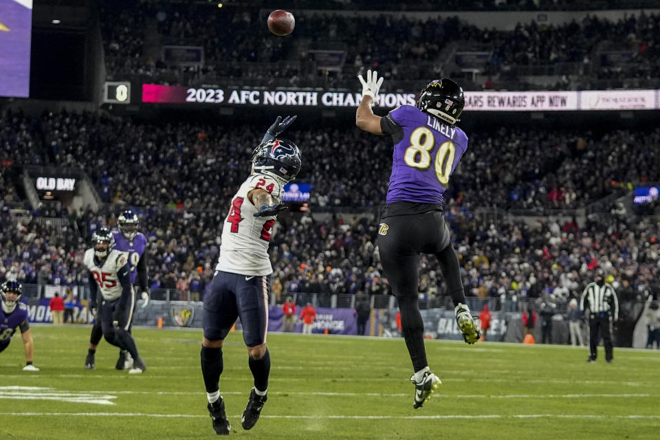 Baltimore Ravens tight end Isaiah Likely (80) makes a touchdown catch in the end zone against Houston Texans cornerback Derek Stingley Jr. (24) during the second half of an NFL football AFC divisional playoff game, Saturday, Jan. 20, 2024, in Baltimore. (AP Photo/Julio Cortez)