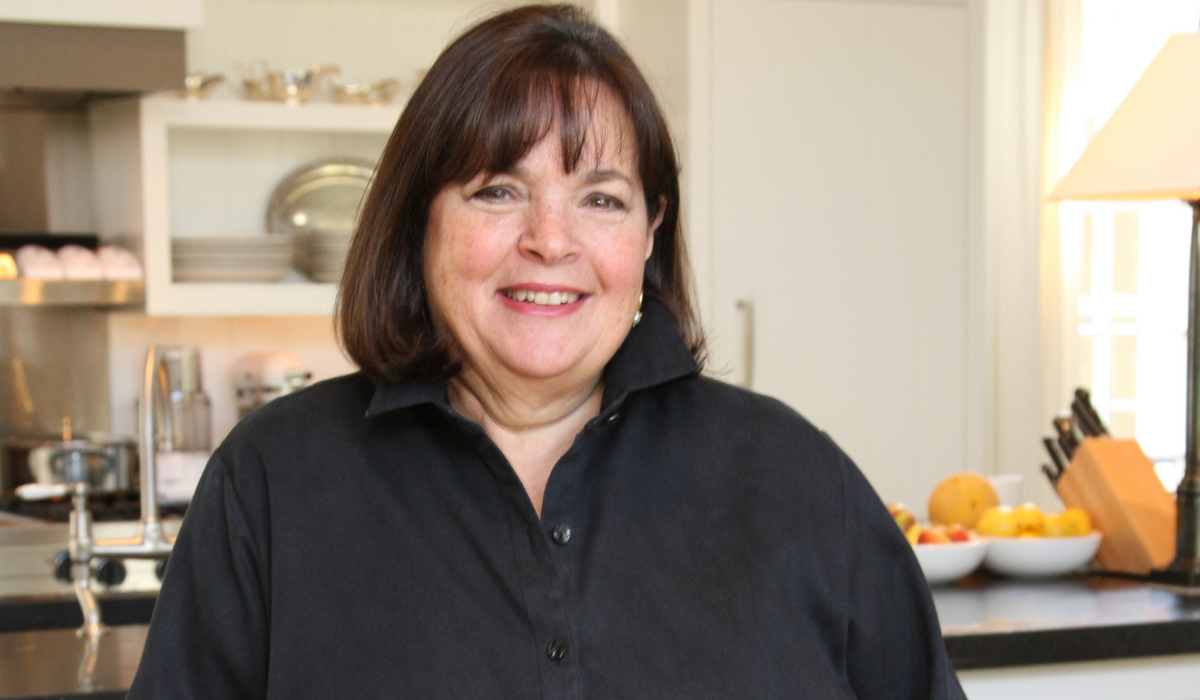 ina garten wearing a black top in a kitchen