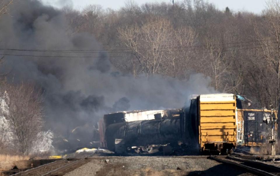 Smoke rises from a derailed cargo train in East Palestine, Ohio, on February 4, 2023. A decision to release and burn toxic chemicals from five derailed train cars in East Palestine last year was not necessary, federal officials said on Tuesday (AFP via Getty Images)