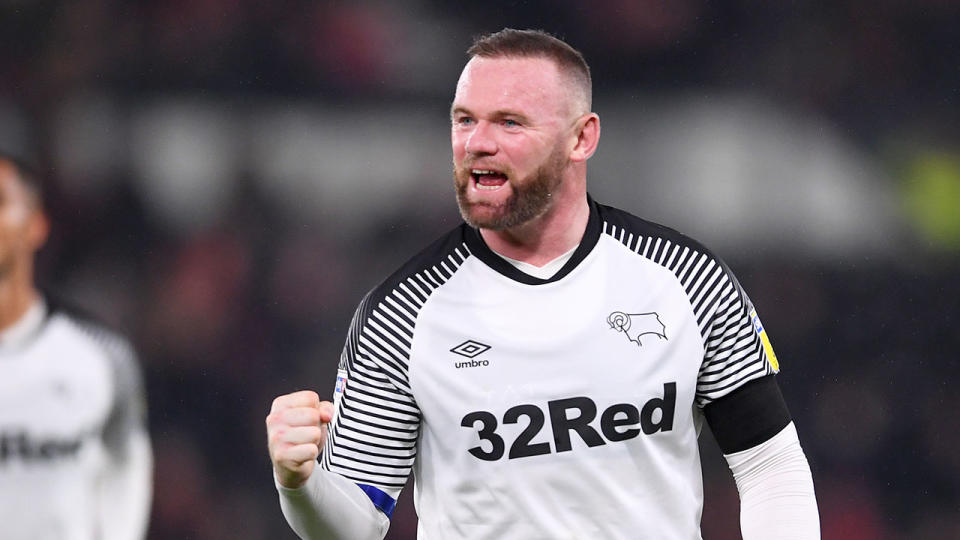 Derby debutant Wayne Rooney celebrates during the win over Barnsley.