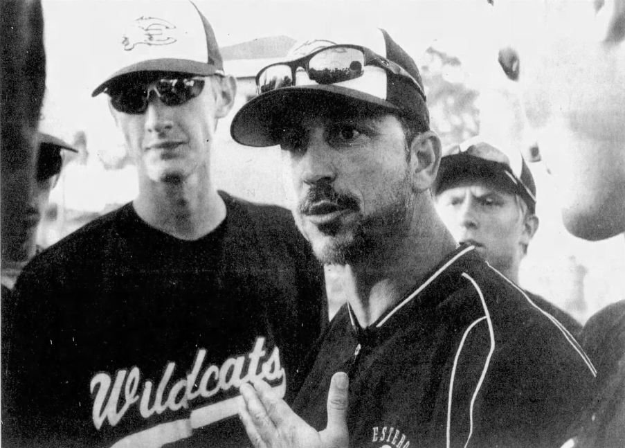 Estero coach Frank Turco urges his Wildcats to stay focused during their 14-1 win over Lely in the Class 5A-District 14 championship game on April 26, 2013.