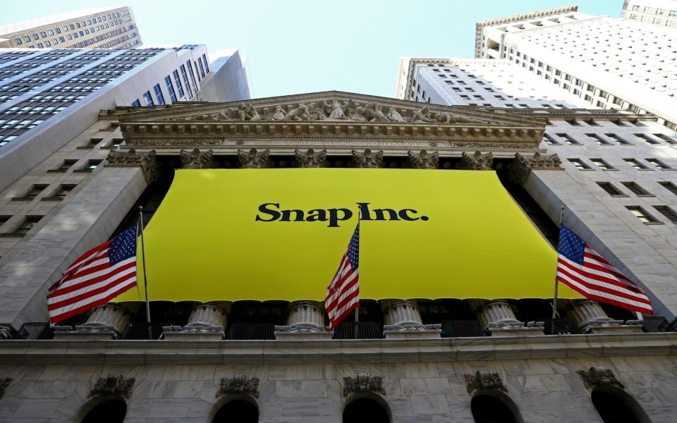 A Snap Inc banner covers the front of the New York Stock Exchange in March 2017, on the day of its public float - Getty Images Contributor