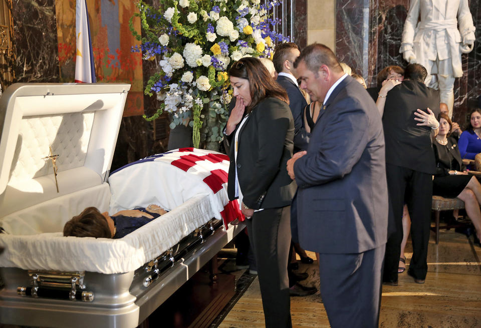People pay their respects to former Louisiana Gov. Kathleen Babineaux Blanco, as she lies in state in the state Capitol rotunda in Baton Rouge, La., Thursday, Aug. 22, 2019. Thursday was the first of three days of public events to honor Blanco, the state's first female governor who died after a years long struggle with cancer.(AP Photo/Michael Democker, Pool)