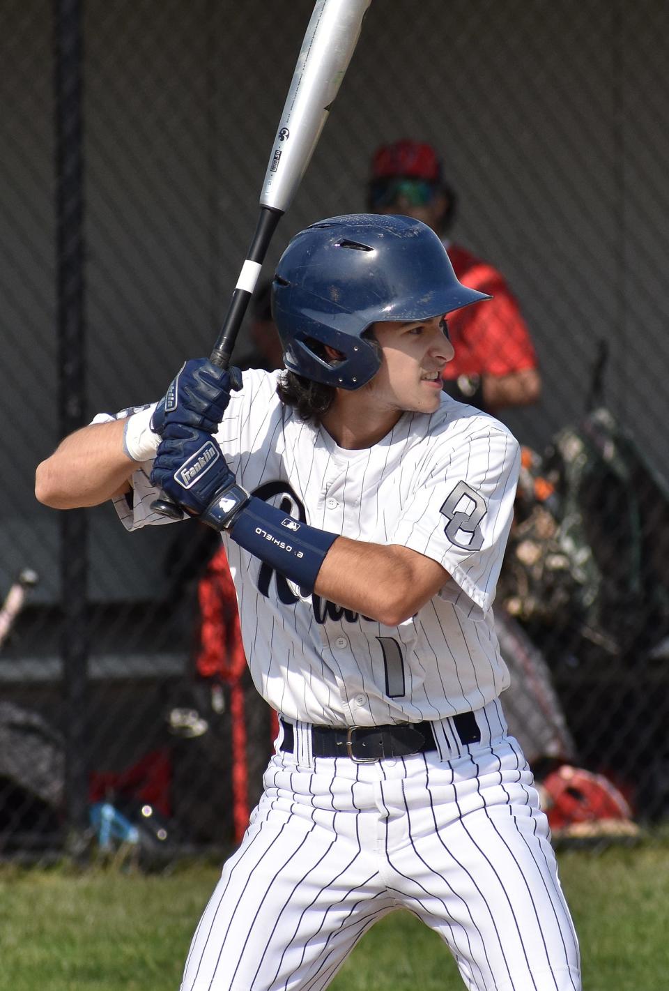 Raiders' Brady Cabral looks for a pitch at the plate.