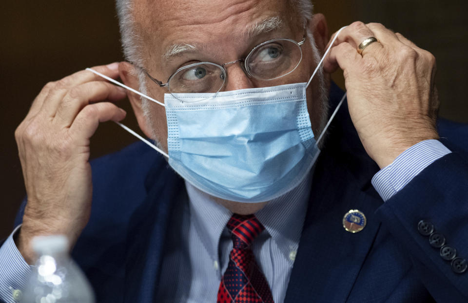 Dr. Robert Redfield, Director of the Centers for Disease Control and Prevention (CDC), testifies during a Senate Appropriations subcommittee hearing on July 2, 2020, on Capitol Hill in Washington. (Saul Loeb/Pool via AP)