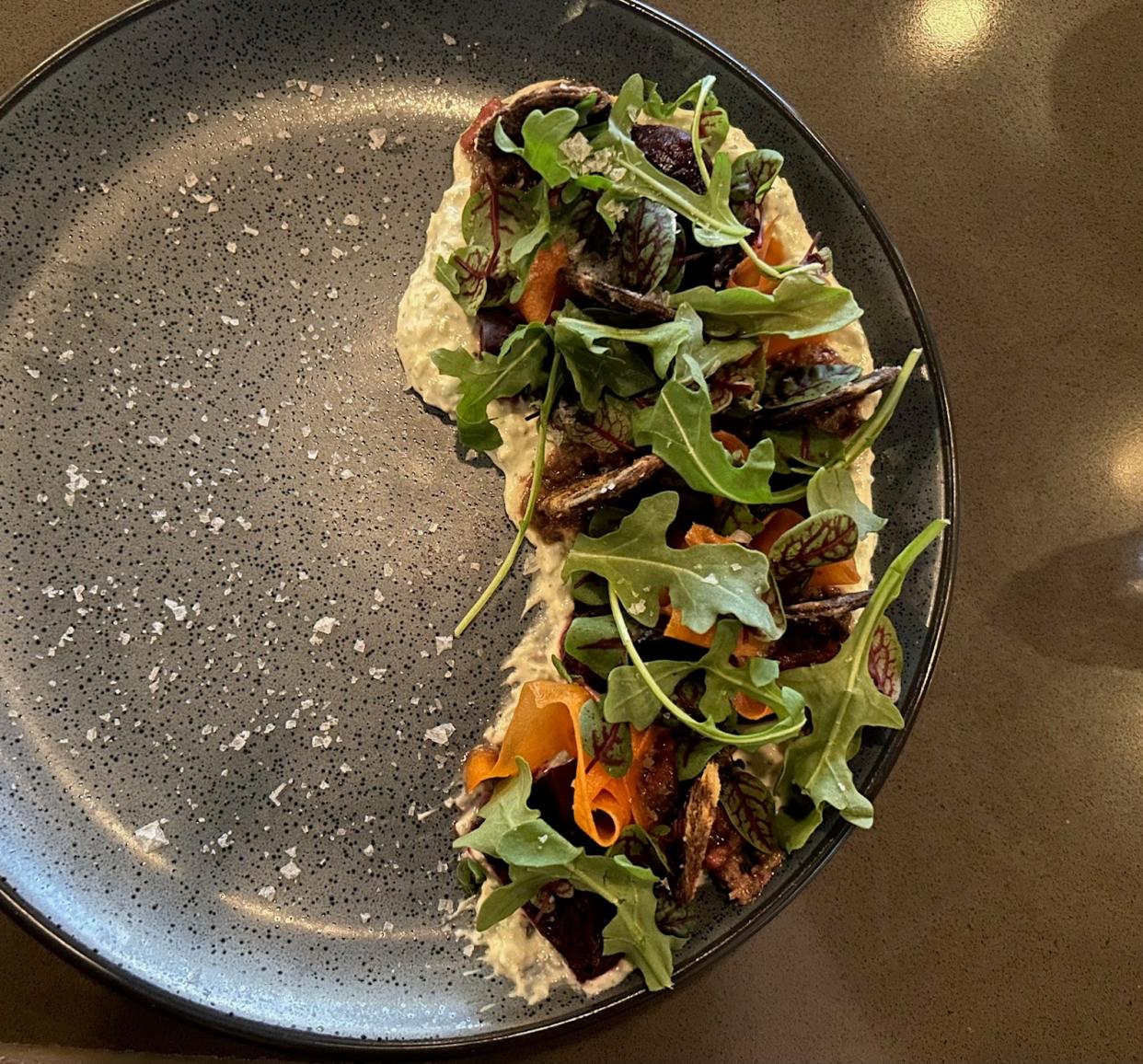 A salad of beets, carrots, feta and arugula at Sinema in Nashville.