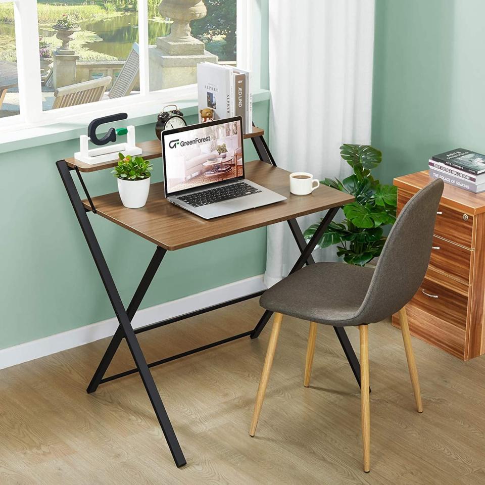 <p>If you work and play hard, you're going to love this <span>GreenForest 2-Tier Folding Desk</span> ($90). It's a small, two-tiered computer desk that can be folded and stored away when not in use. It is perfect for those who work from home in an apartment and requires no assembly.</p>