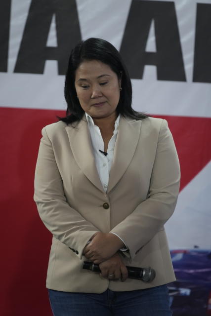 Presidential candidate Keiko Fujimori holds a press conference in Lima, Peru, Thursday, June 10, 2021. As one claims victory and the other electoral fraud, tensions continue to grow around Peru's presidential election run-off vote count with just decimals of percentage points separating left leaning Pedro Castillo from rightwing populist rival Keiko Fujimori. (AP Photo/Martin Mejia)