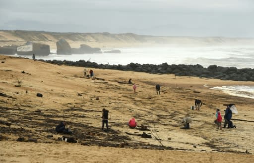 People on the beach Monday at Capbreton, southwestern France, where packages of cocaine have been found in recent days