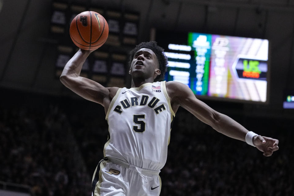 Purdue guard Myles Colvin (5) goes up for a dunk against Jacksonville during the second half of an NCAA college basketball game in West Lafayette, Ind., Thursday, Dec. 21, 2023. (AP Photo/Michael Conroy)