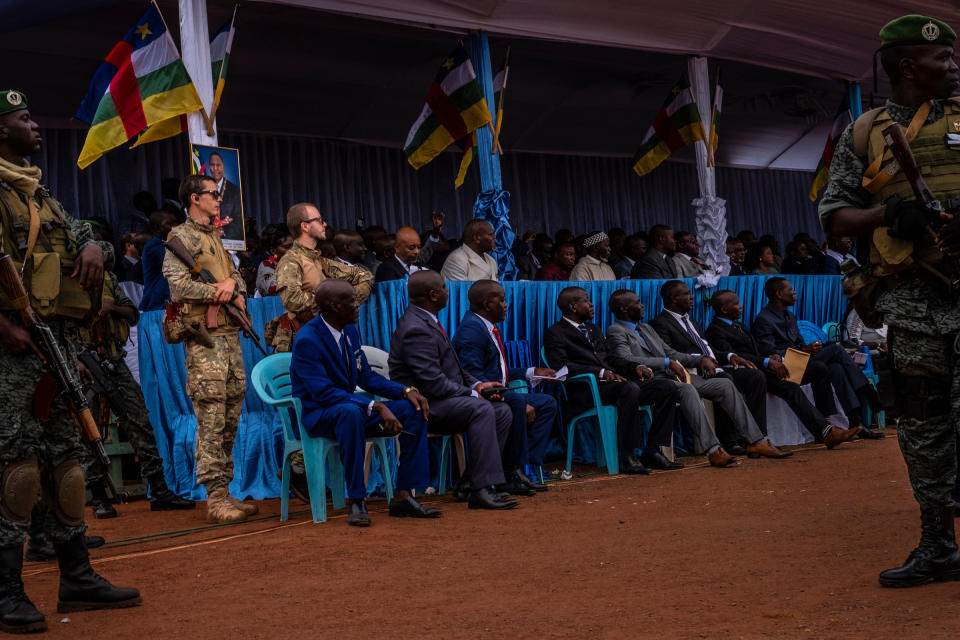 Russian mercenaries from the Wagner Group guard the VIP stand that the president sits in during Labour Day celebrations in Bangui, Central African Republic, on May 1, 2019. The mercenaries act as the president’s security, as well as acting as trainers for the Central African military.<span class="copyright">Ashley Gilbertson—The New York Times/Redux</span>