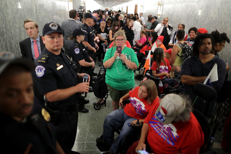 Health care bill protesters descend on Senate hearing