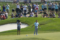 Louis Oosthuizen throws his hat to the ground in reaction to nearly sinking a long approach shot on the 18th hole during the final round of the 3M Open golf tournament in Blaine, Minn., Sunday, July 25, 2021. (AP Photo/Craig Lassig)