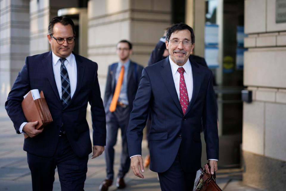 Kenneth Dintzer, litigator for the US Department of Justice, right, and David Dahlquist, senior trial counsel in the antitrust division at the US Department of Justice, left, leave federal court. (Photo: Ting Shen/Bloomberg)