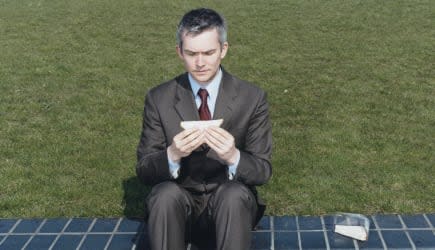 Man Staring at Sandwich