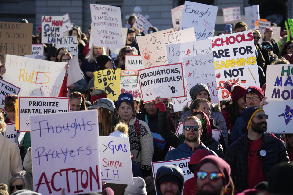 Students and parents from schools across Colorado take part in a rally calling for state lawmakers to consider gun control measures during the current legislative session Friday, March 24, 2023, outside the State Capitol in Denver. (AP Photo/David Zalubowski)