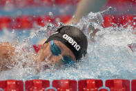 Federica Pellegrini of Italy swims in a heat during the women's 200-meter freestyle at the 2020 Summer Olympics, Monday, July 26, 2021, in Tokyo, Japan. (AP Photo/Martin Meissner)