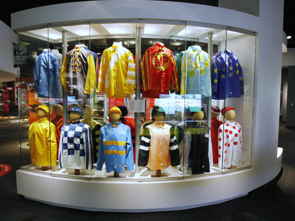 FILE - This Monday, April 19, 2010 file photo shows a display of Kentucky Derby winners' silks at the Kentucky Derby Museum in Louisville, Ky. Although Louisville is best-known for the Derby, visitors in town for the May 5, 2012 race will find plenty of other things to do and see around town, from museums to historic hotels to trendy restaurants. (AP Photo/Ed Reinke)