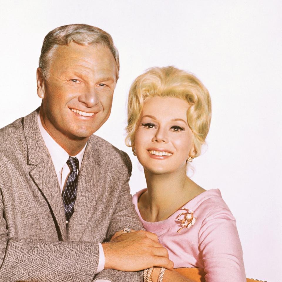 Eva Gabor and Eddie Albert (Original Caption) Eddie Albert and Eva Gabor in a publicity handout for the TV series Green Acres 1965-1971.