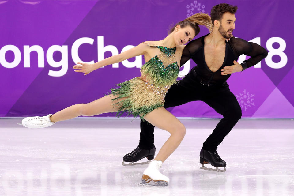 <p>Gabriella Papadakis and Guillaume Cizeron of France compete during the Figure Skating Ice Dance Short Dance on day 10 of the PyeongChang 2018 Winter Olympic Games at Gangneung Ice Arena on February 19, 2018 in Pyeongchang-gun, South Korea. (Photo by Maddie Meyer/Getty Images) </p>