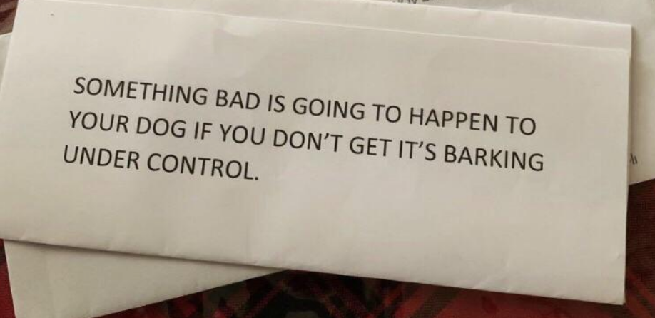 A note says "something bad is going to happen to your dog if you don't get its barking under control"