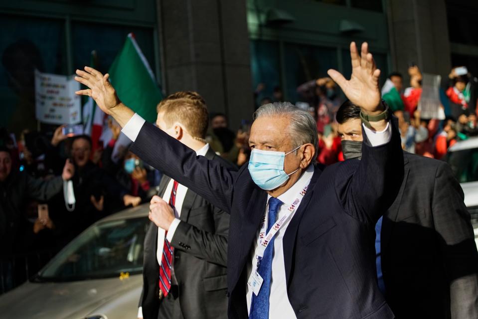 Mexican President Andres Manuel Lopez Obrador greets supporters as he departs to United Nations on Tuesday, Nov 9, 2021, in New York. (AP Photo/Eduardo Munoz Alvarez)