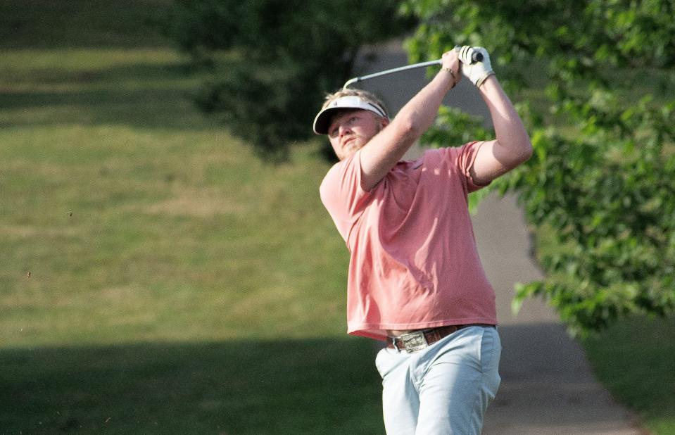 Drew Todd hits on the third hole at Cascades Golf Course in the Bloomington City Golf Tournament on July 9, 2023.