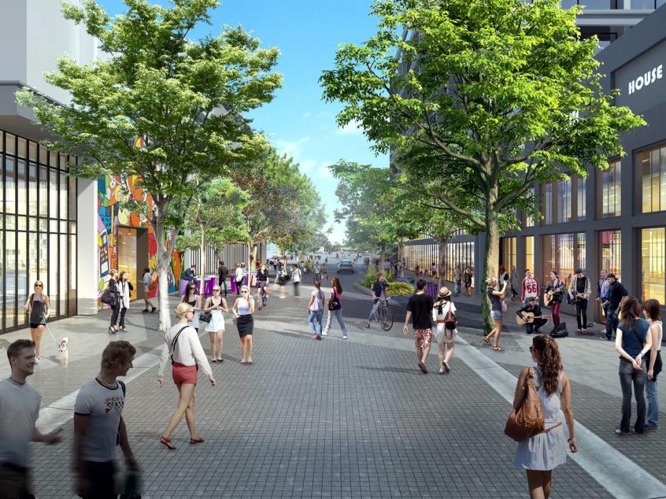 A conceptual rendering shows how Northwest First Avenue in Wynwood could be turned into a “woonerf,” a Dutch-inspired street in which pedestrians and slow-moving cars mix, under a new master plan for the district.