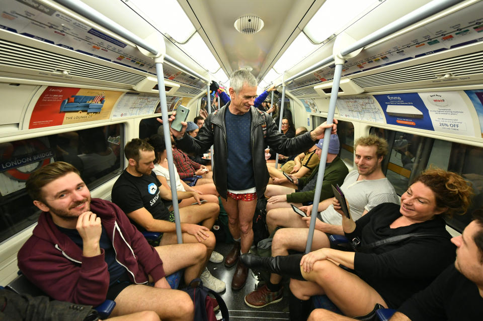 People on the Underground on the No Trousers Tube Ride in London. (Photo: Dominic Lipinski/PA Images via Getty Images)