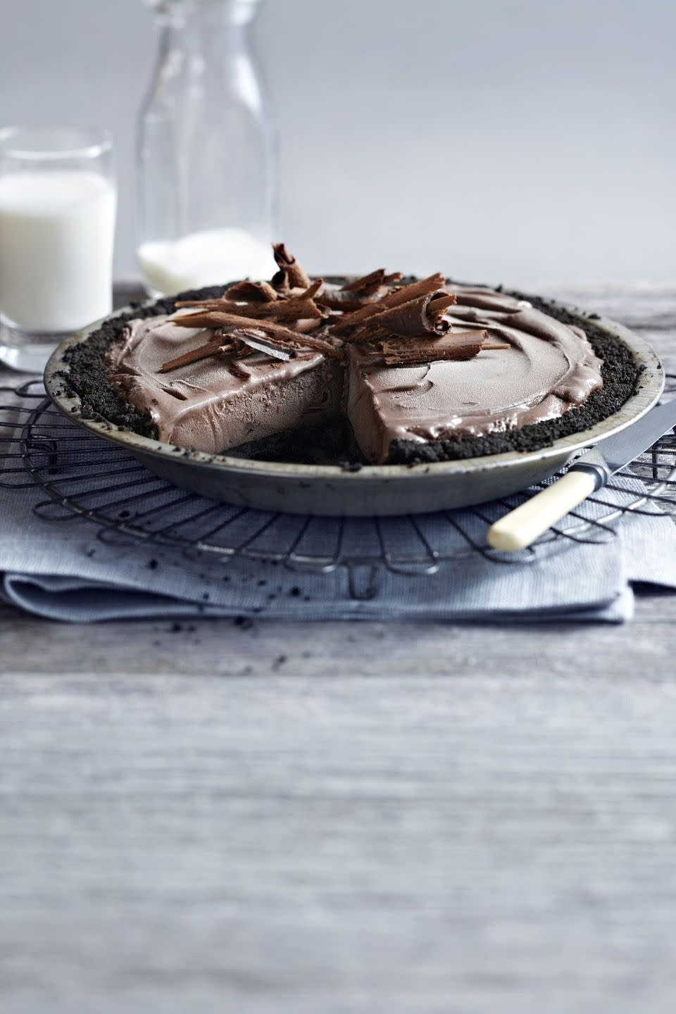chocolate ice cream pie with a chocolate cookie crust and chocolate shavings on top